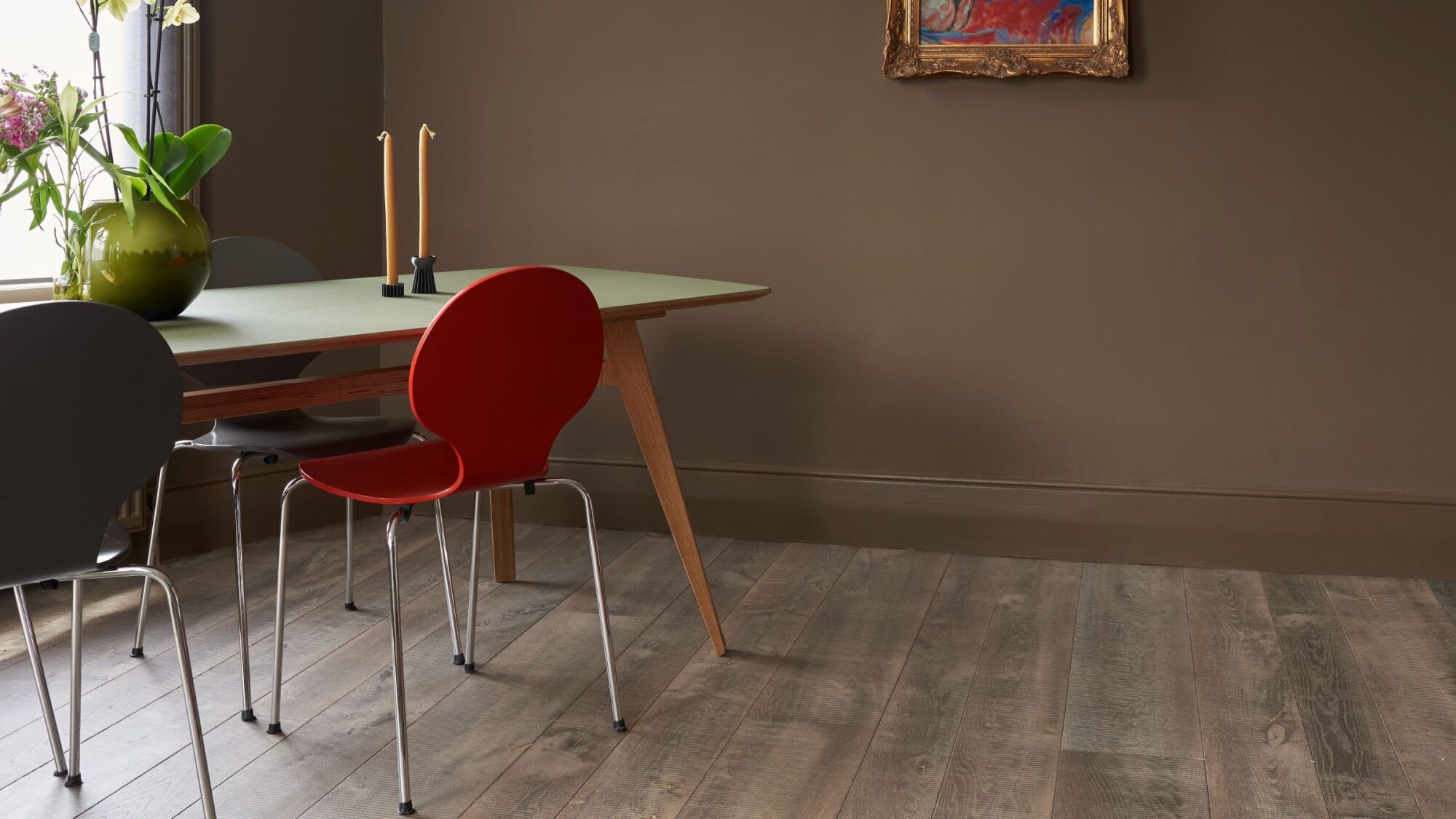rustic oak flooring in dining room with table & chair