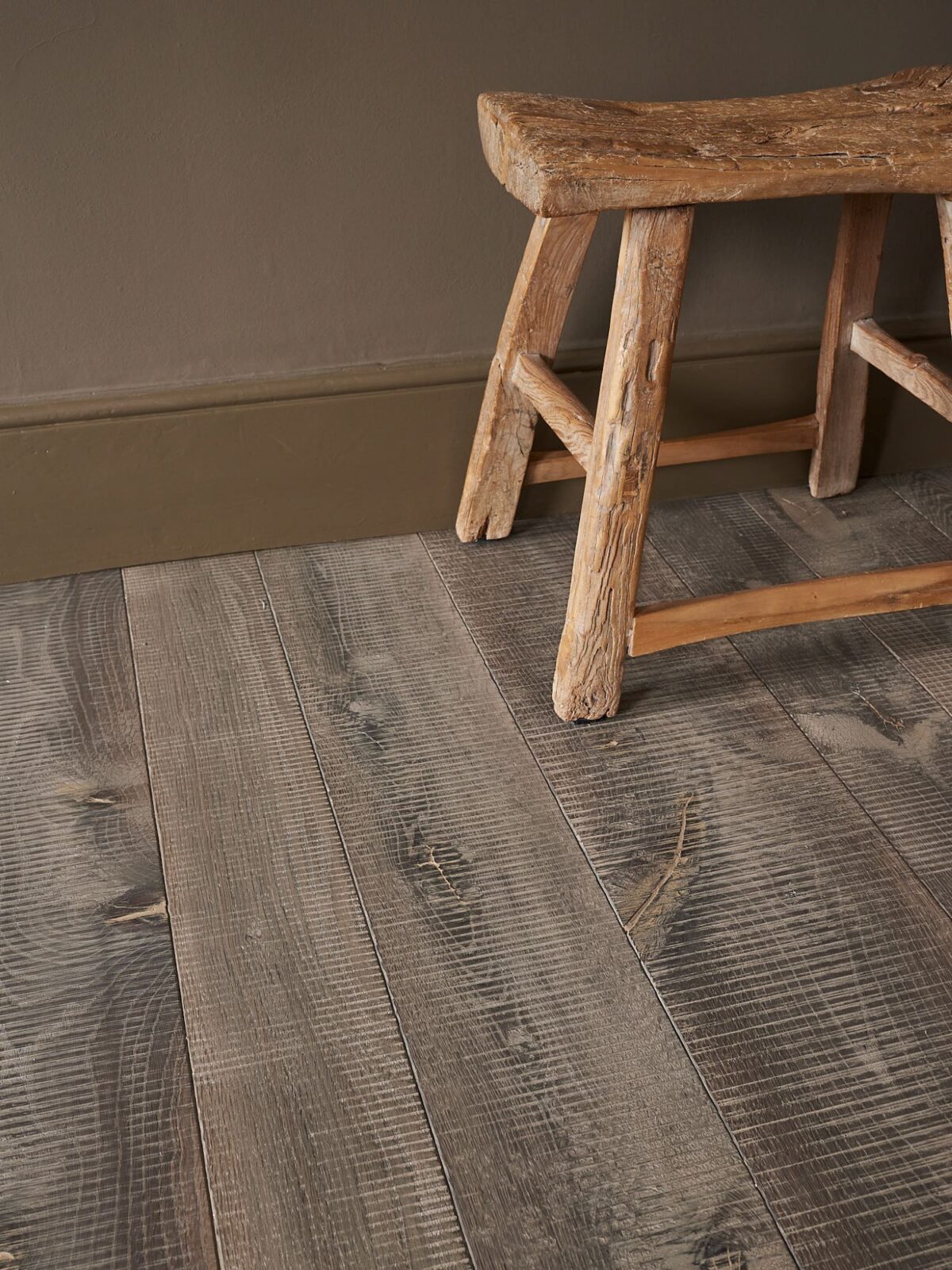 rustic oak flooring with stool