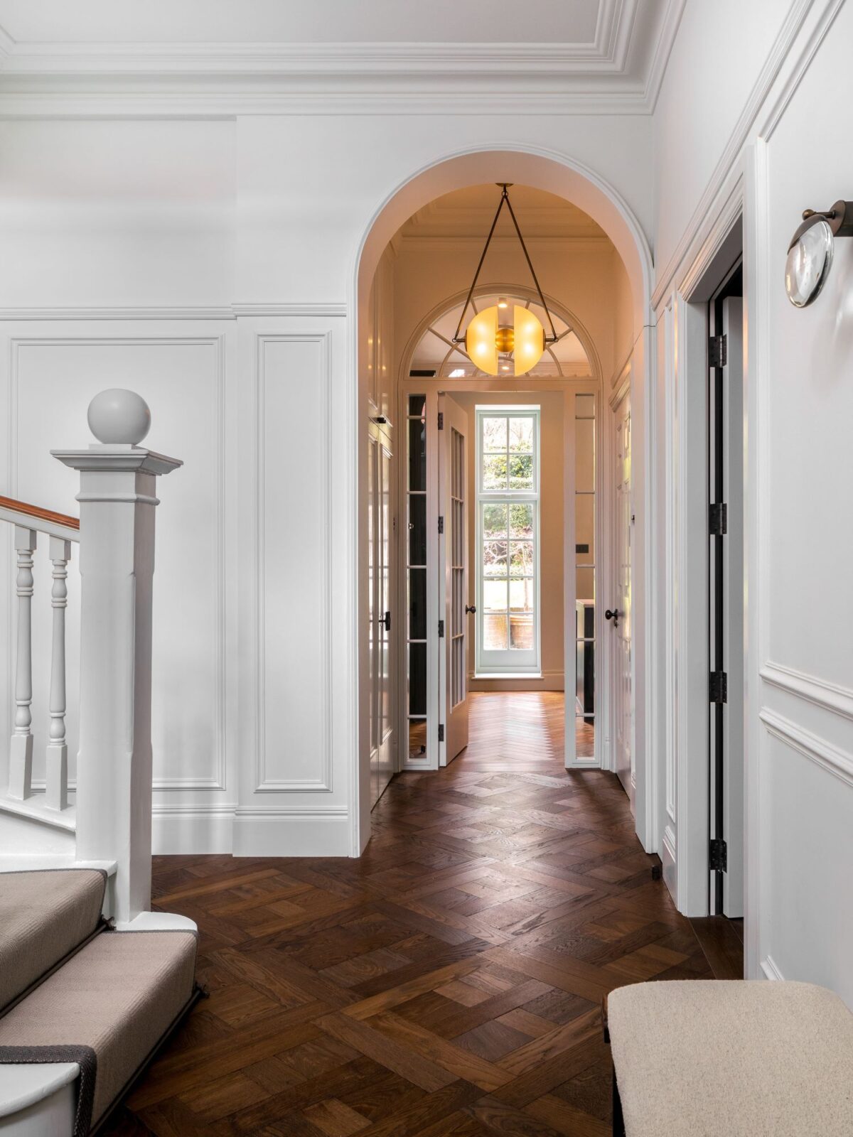 Dark brown Landmark Knole oak Cross panel parquet with border in hallway of Edwardian Villa in London
