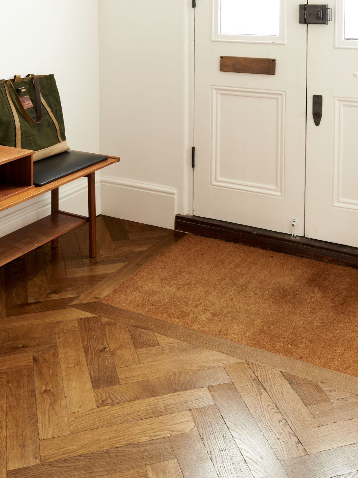 herringbone oak parquet flooring in hallway entrance