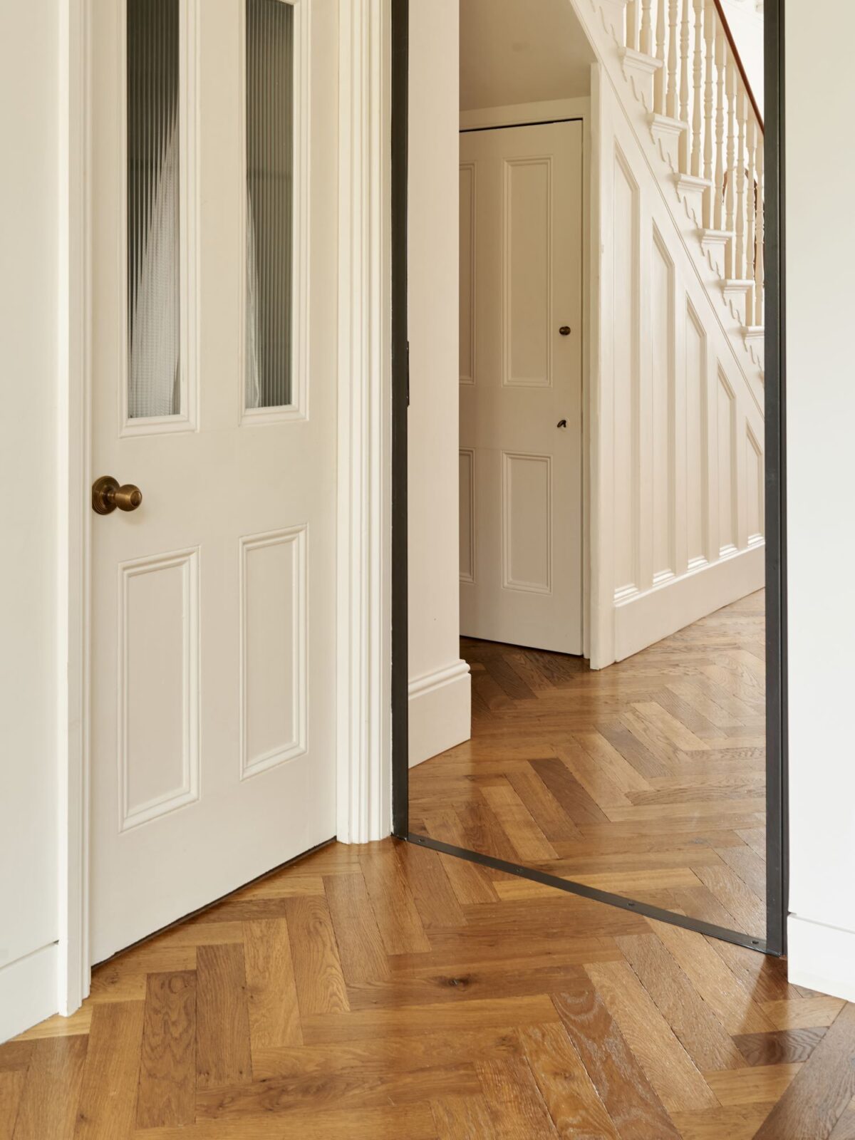 hallway with oak parquet herringbone floor