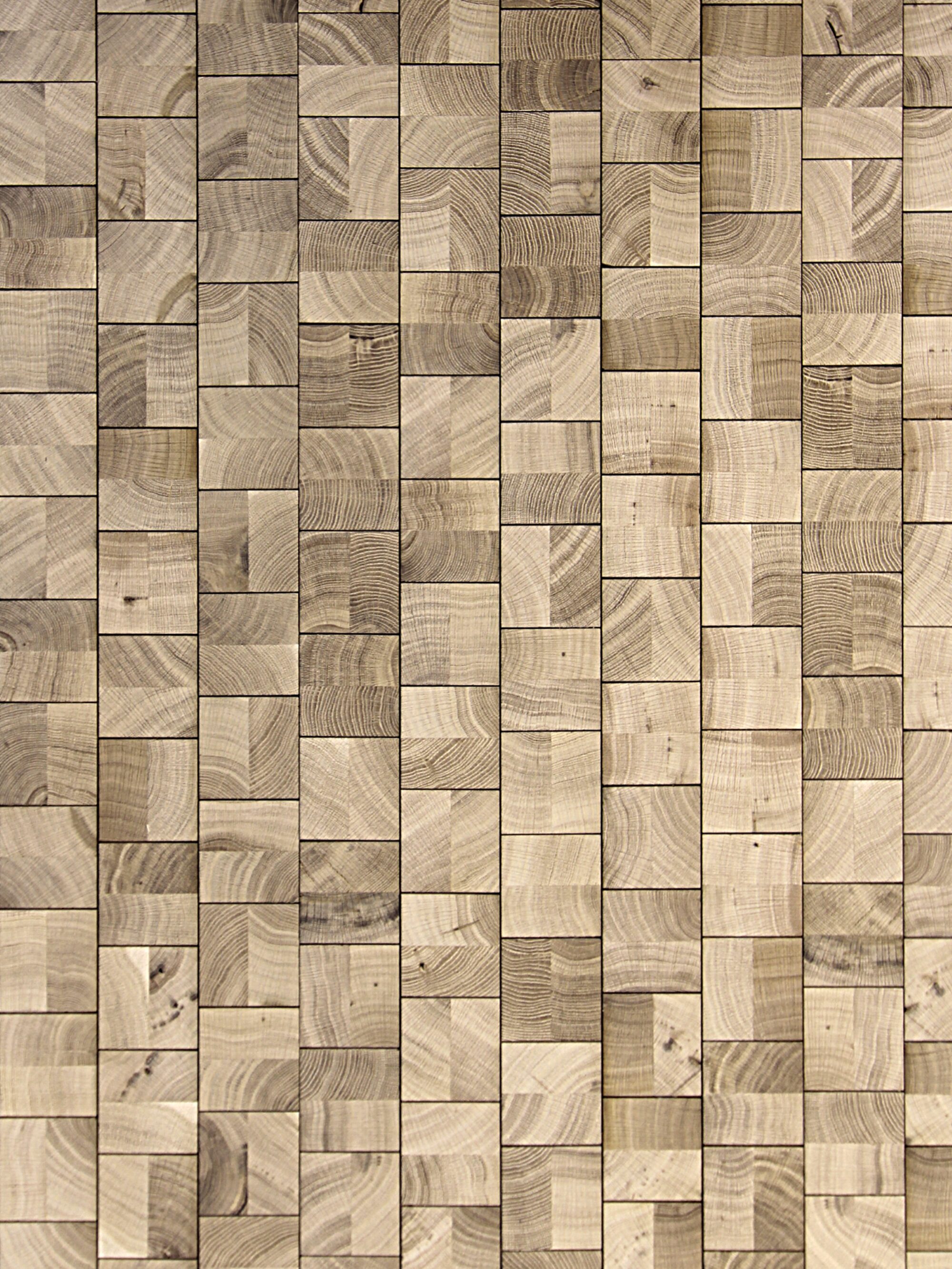 Cube Natural end-grain oak flooring by OscarOno: pale, natural-toned square blocks laid in staggered vertical rows, with strong growth-ring patterns, small knots and soft variation between light and darker blocks