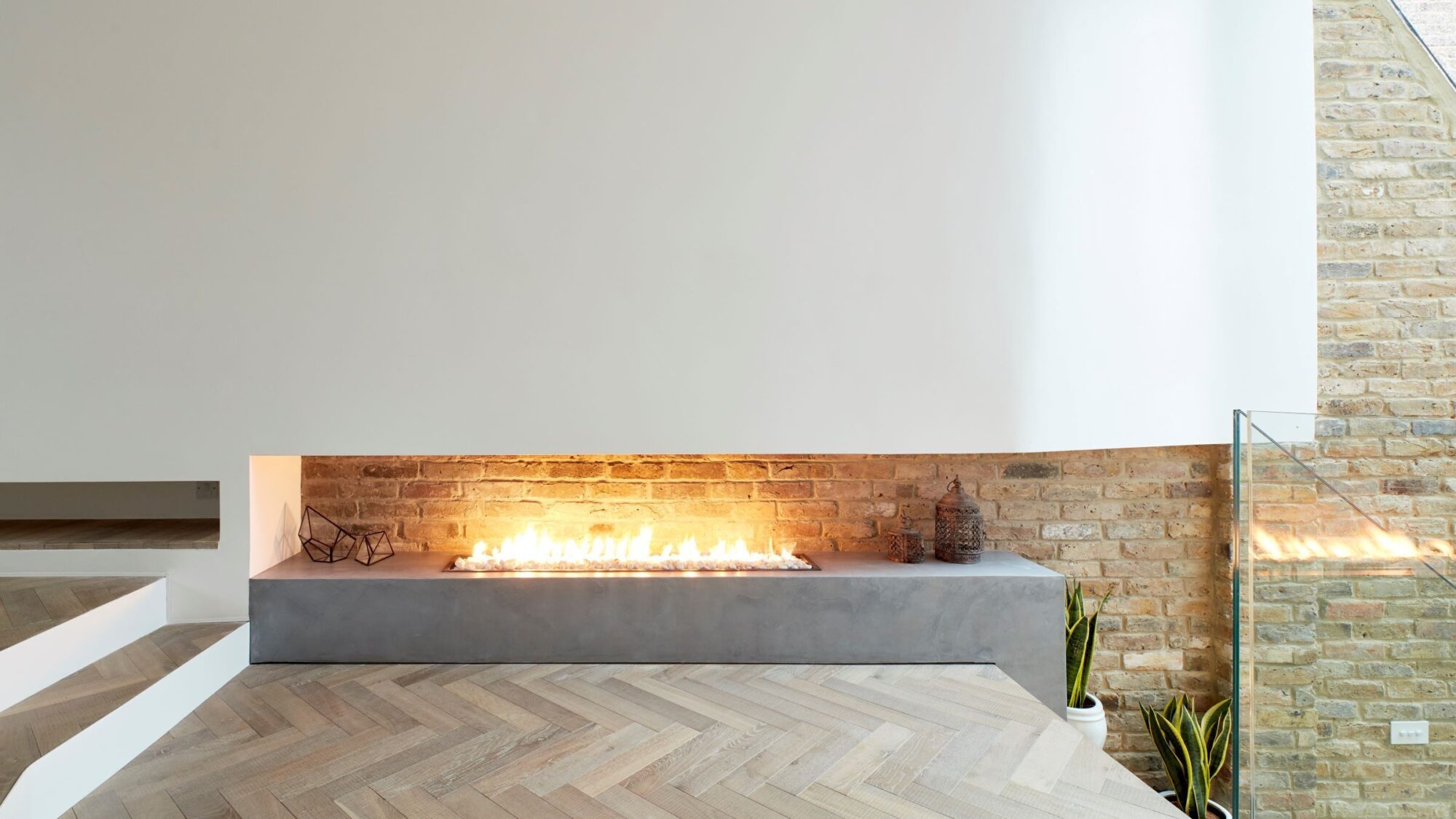 M Clayton tate bute herringbone floor with modern fire place