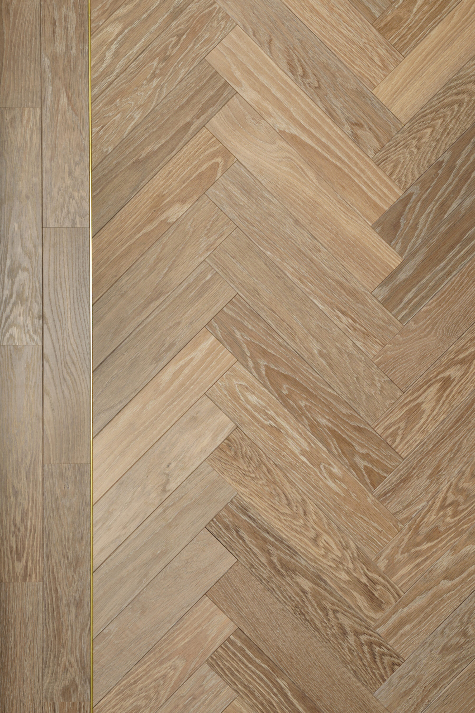 landmark dyrham herringbone with double border & brass inlay