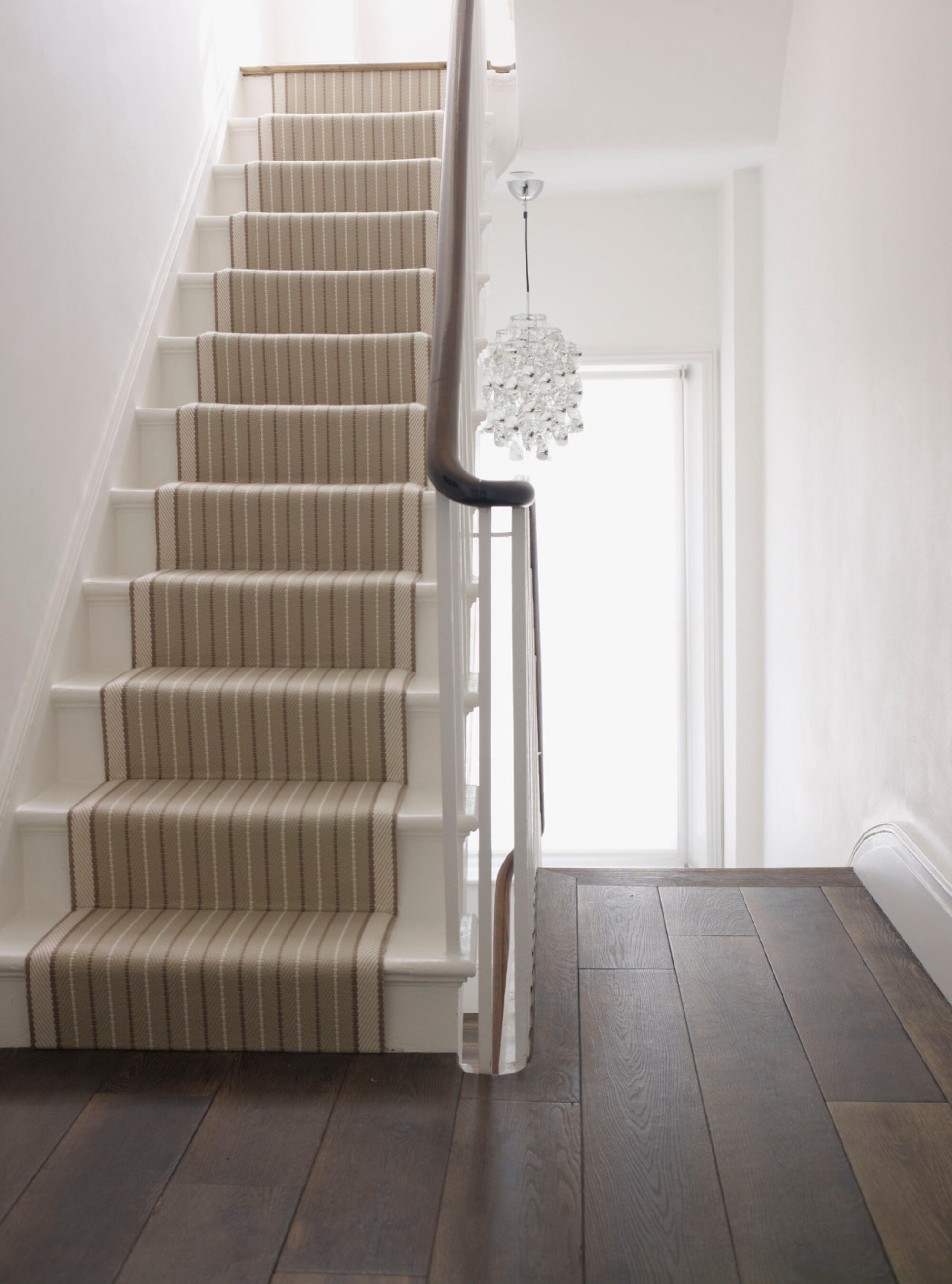 Oak landmark killerton plank dark timber floor on landing with stair runner