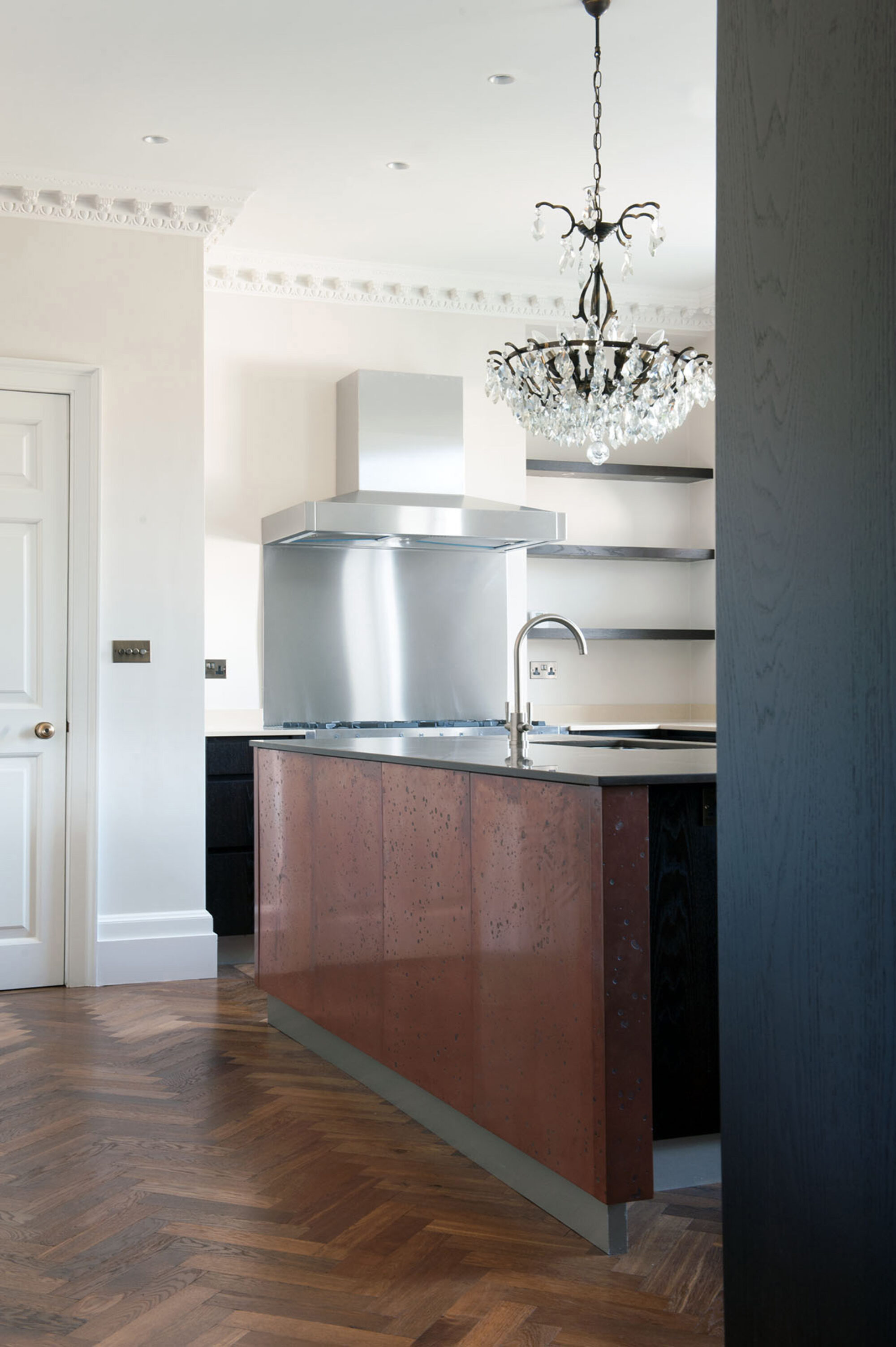 Oak landmark tatton herringbone in kitchen with copper clad island