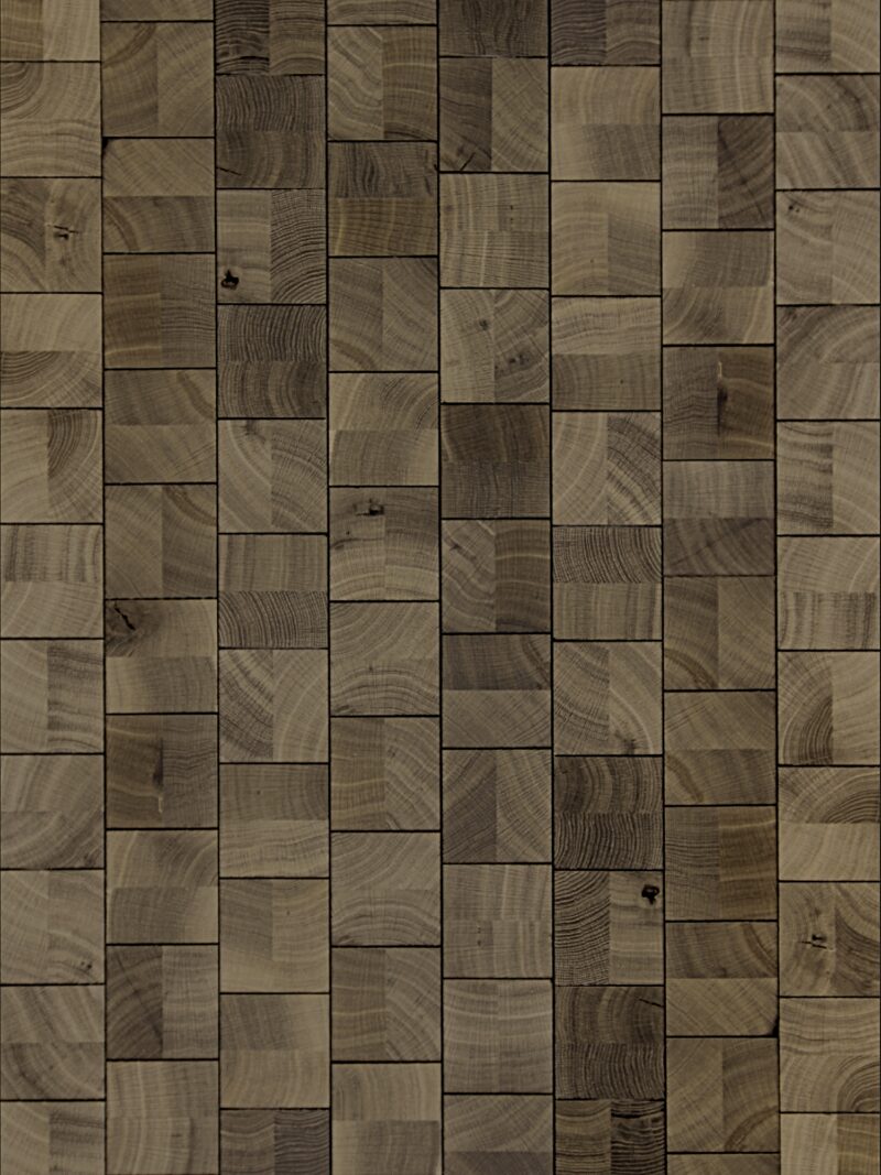Cube Smoke end-grain oak flooring by OscarOno: greyish-brown square blocks laid in staggered vertical rows, with growth rings, knots and tonal variation from block to block.
