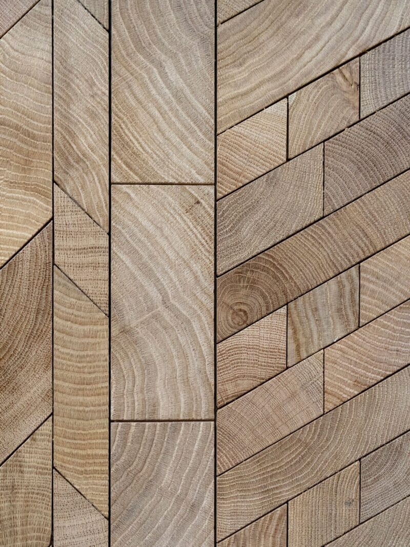 Endgrain oak in neutral oak composed of various patterns in different sized blocks.