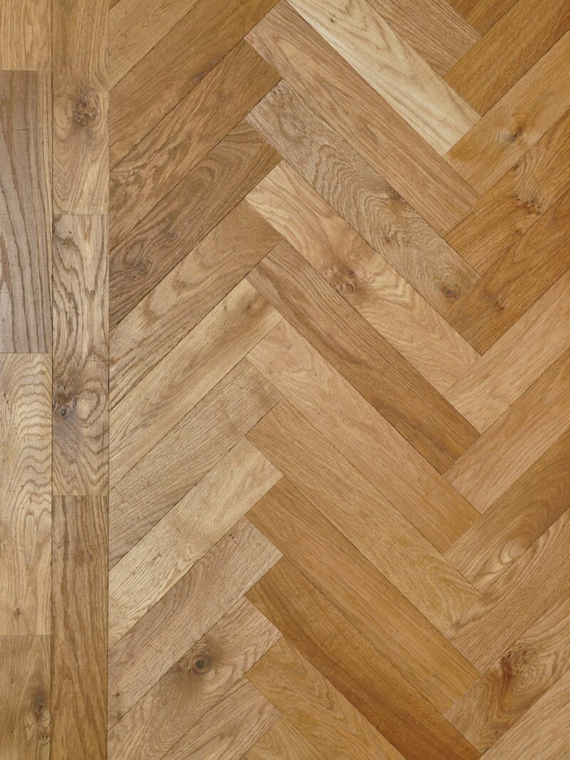 Natural landmark standon oak herringbone parquet flooring with double border