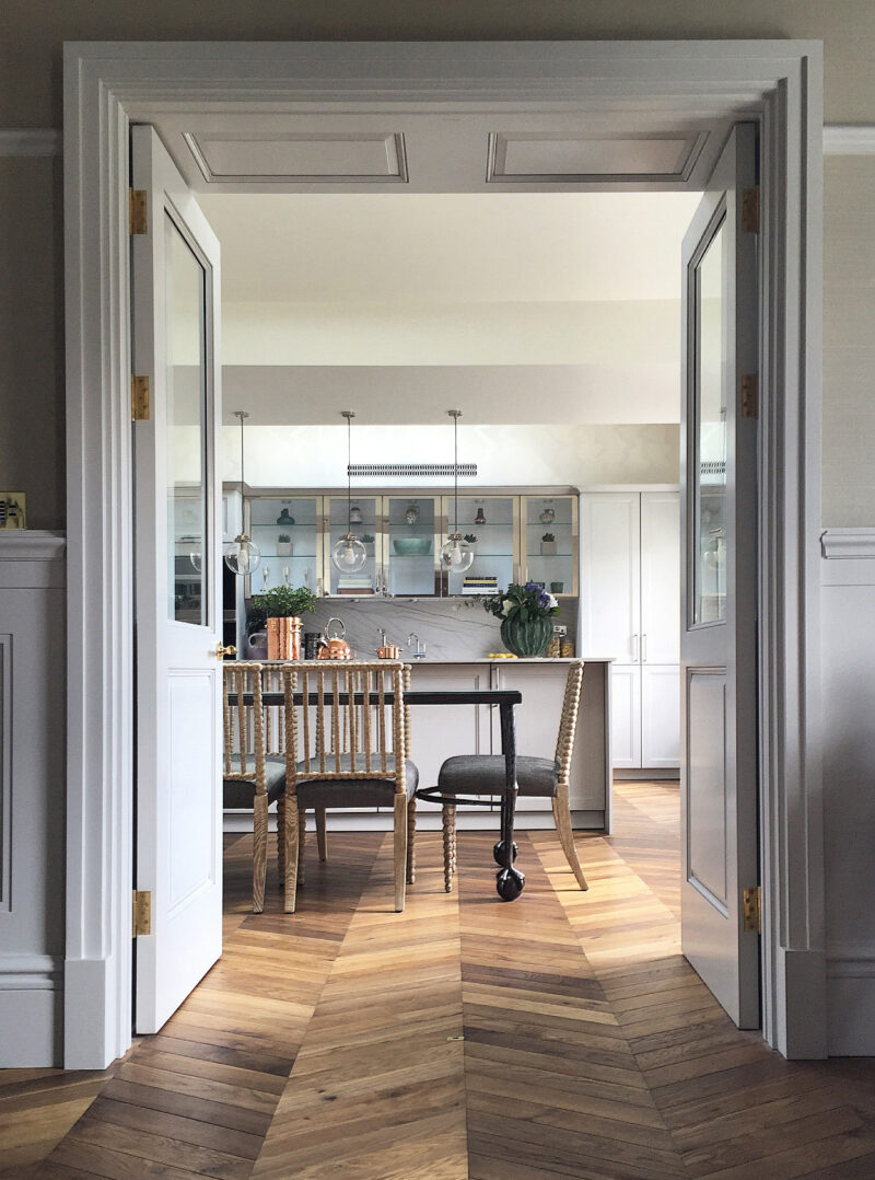 Oak landmark dalton chevron in leinster square looking through doors into kitchen