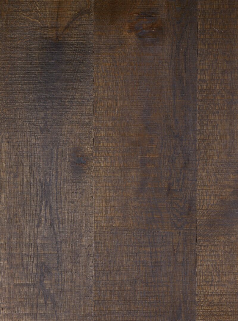 dark brown tate iona oak plank floor with black accents in the grain and the bandsaw marks
