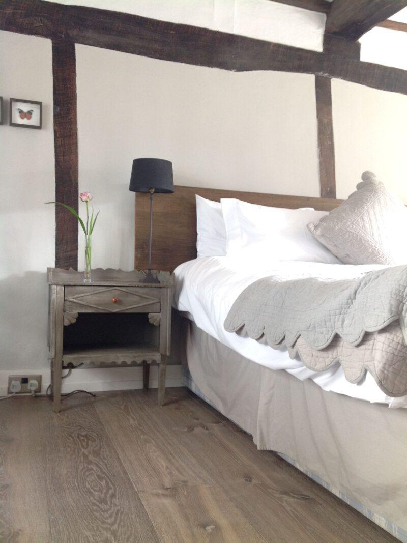 Oak dyrham wide board floor in bedroom swanhouse hastings