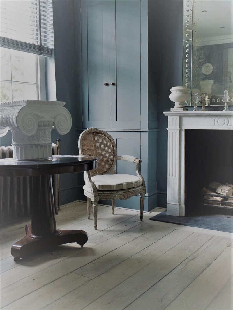 Oak magma etna plank with stone fireplace and antique chair