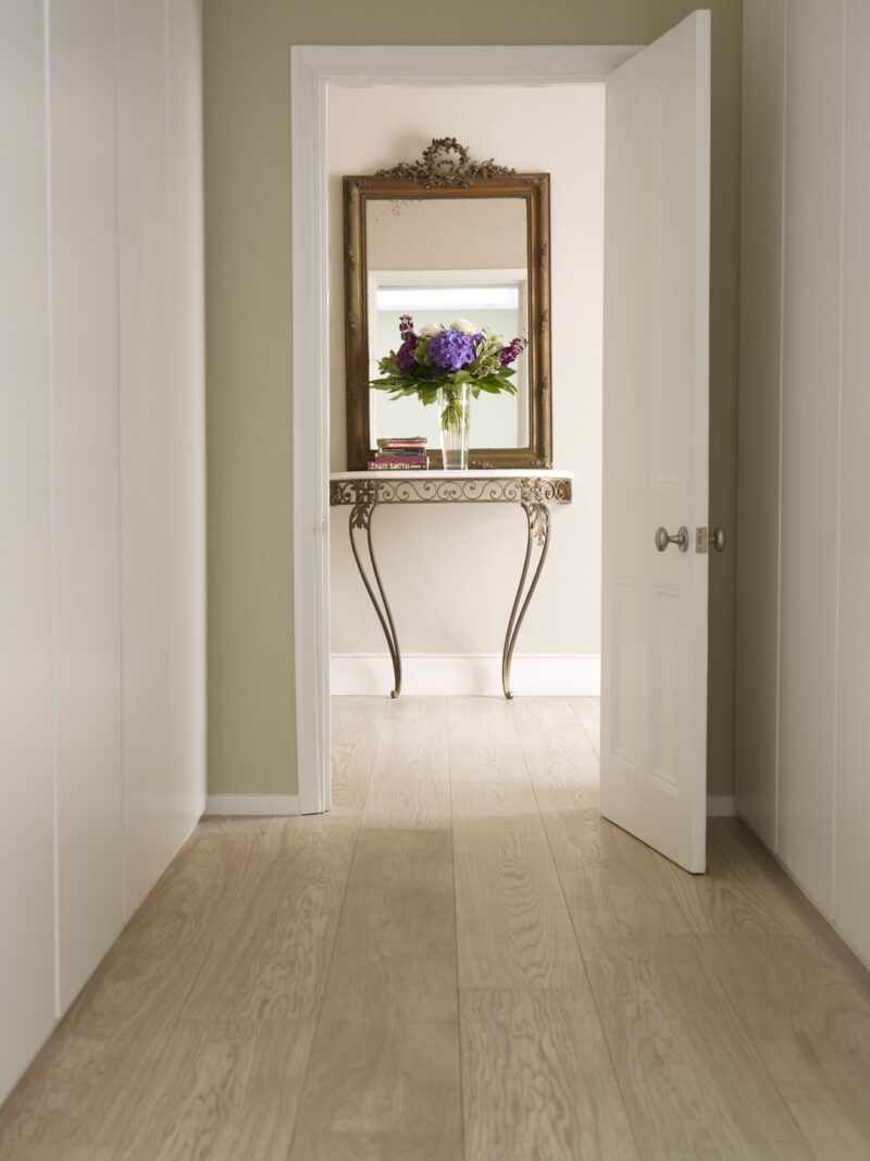 Polar white floor hallway with mirror