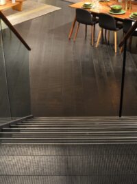 Dark textured oak floor Tate Arran by solidfloor co uk in basement habitat tottenham court road on steps