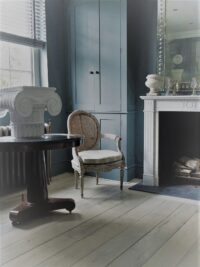Oak magma etna plank with stone fireplace and antique chair