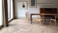 Tate bute herringbone floor with chairs and table