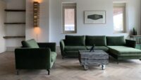 Tate bute herringbone floor with green sofa 3a